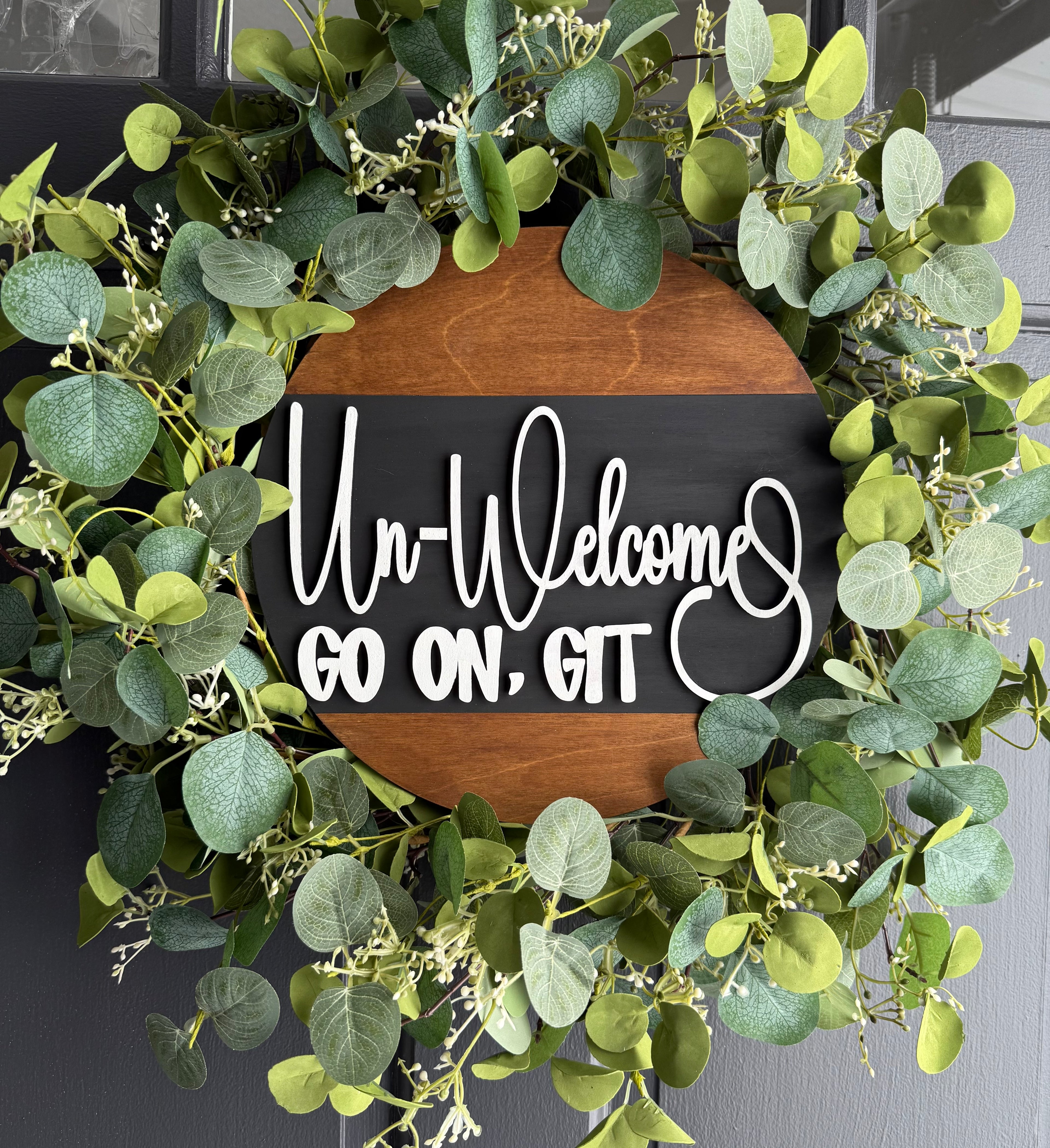 Un-Welcome Wood Round