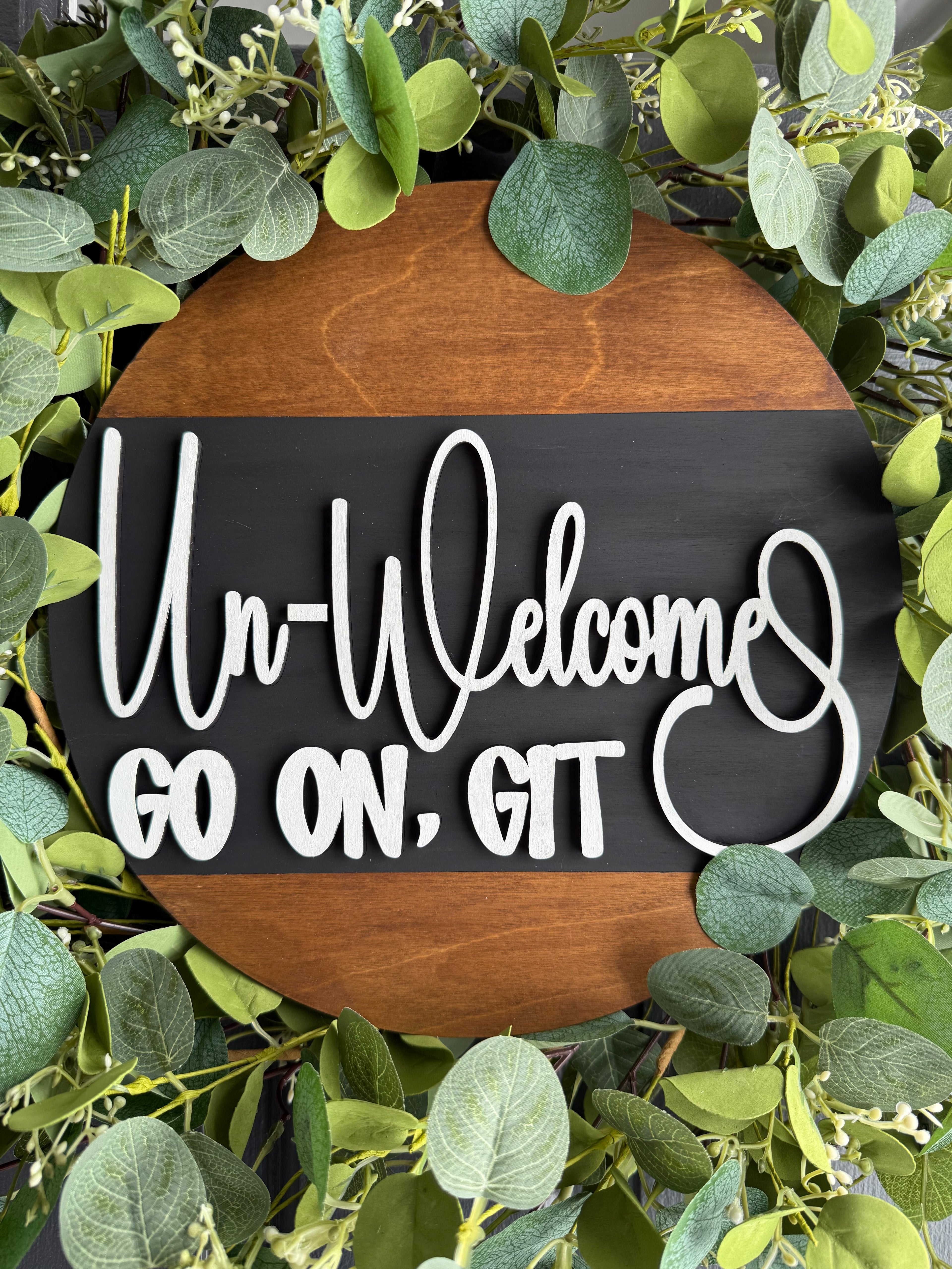 Un-Welcome Wood Round