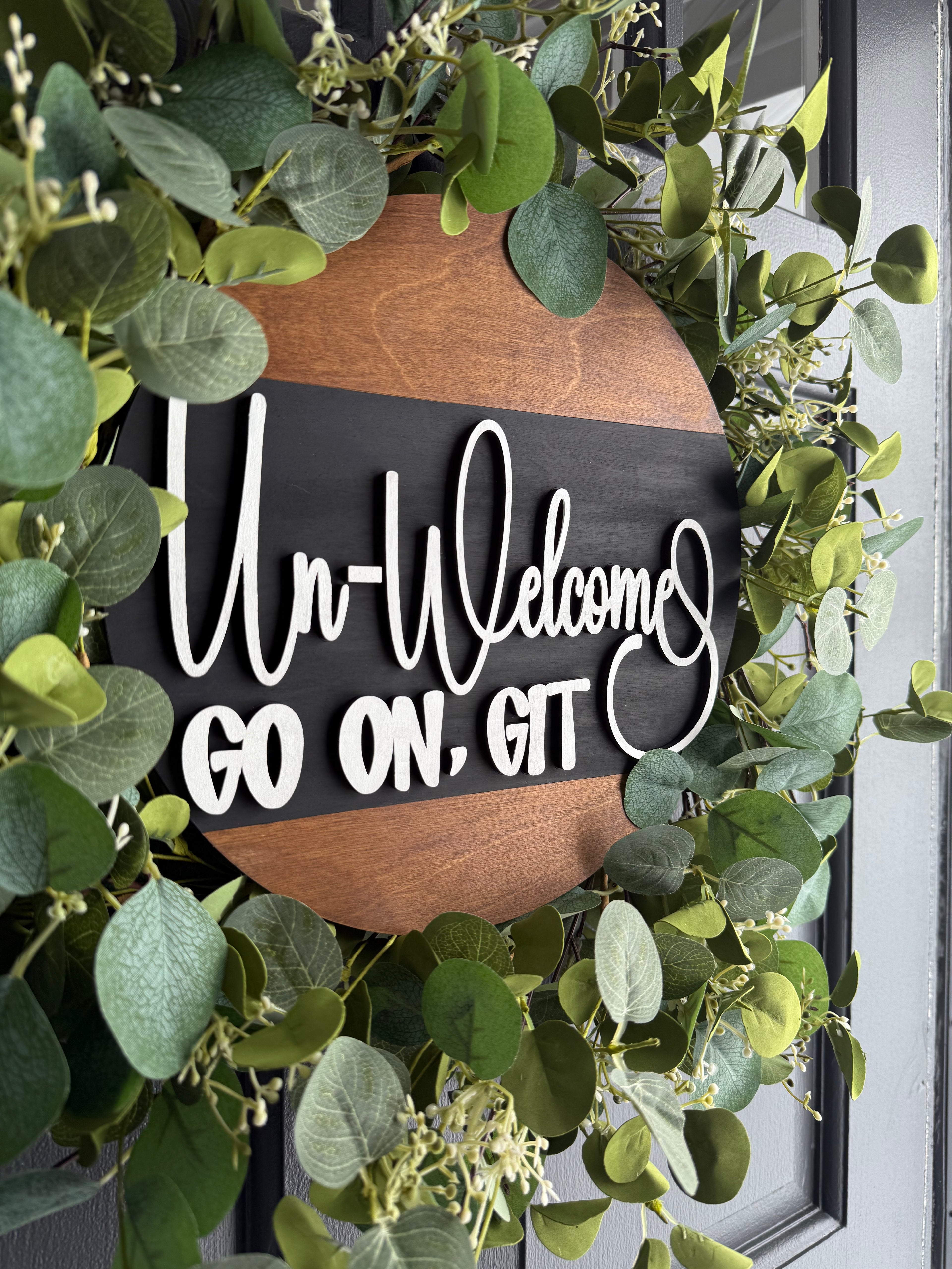 Un-Welcome Wood Round